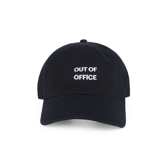 Beige cap with embroidered text “Out of Office,” trendy travel and lifestyle cap