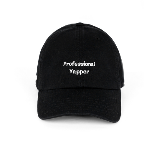 Black cap with embroidered text “Professional Yapper,” funny sarcastic lifestyle cap.