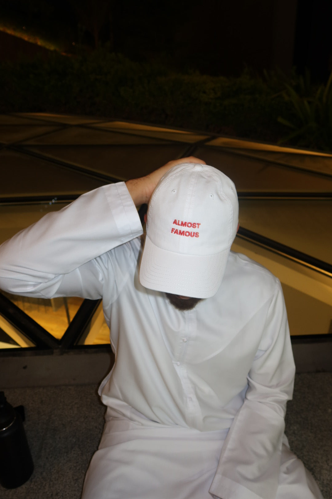 white nike hat with kiss